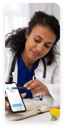 Doctor reviewing clinical trial enrollment details with a volunteer on a mobile device